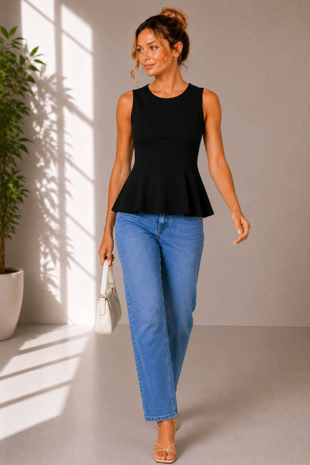 Sleeveless Flared Peplum Top – Black