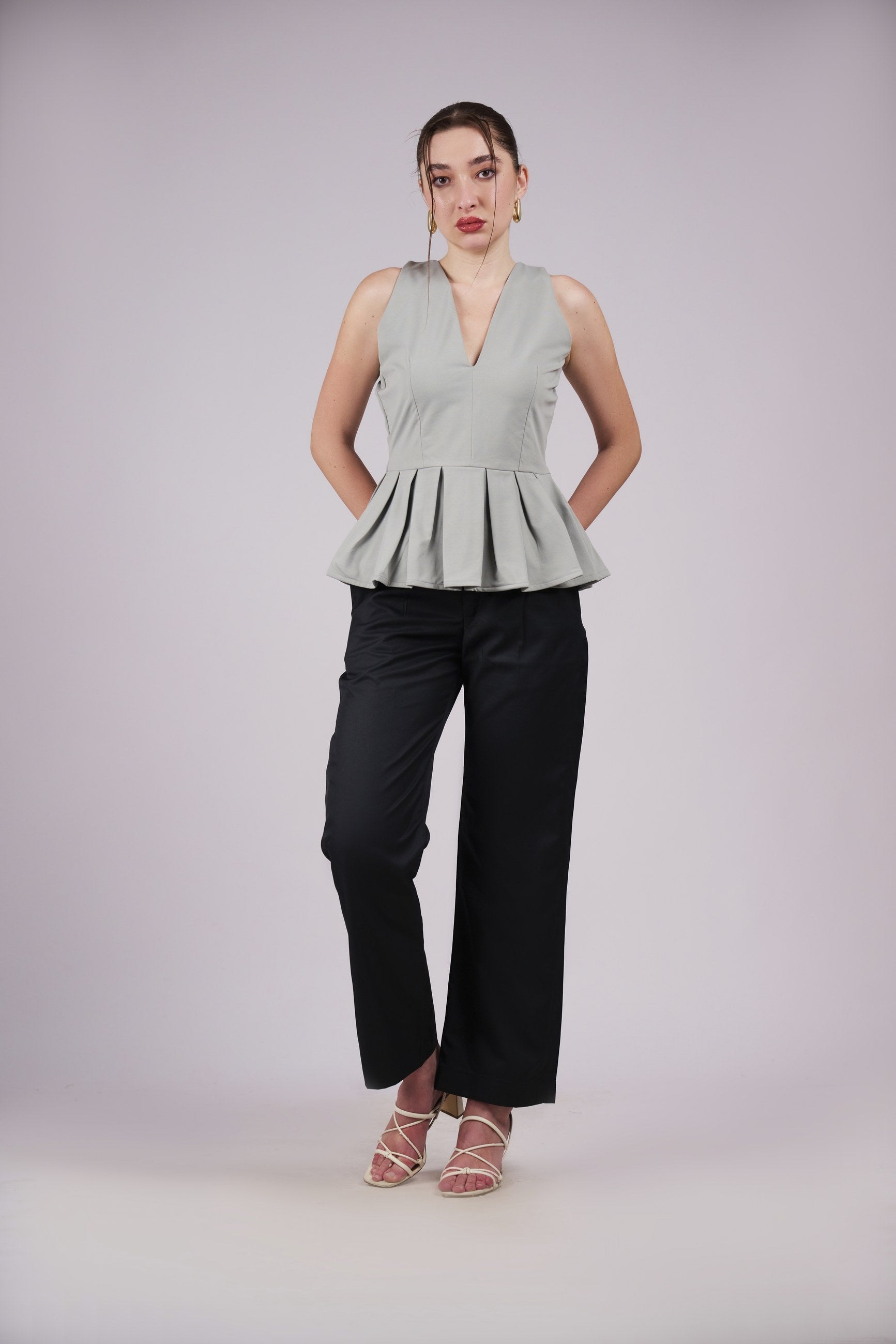 Sleeveless Peplum Top – White