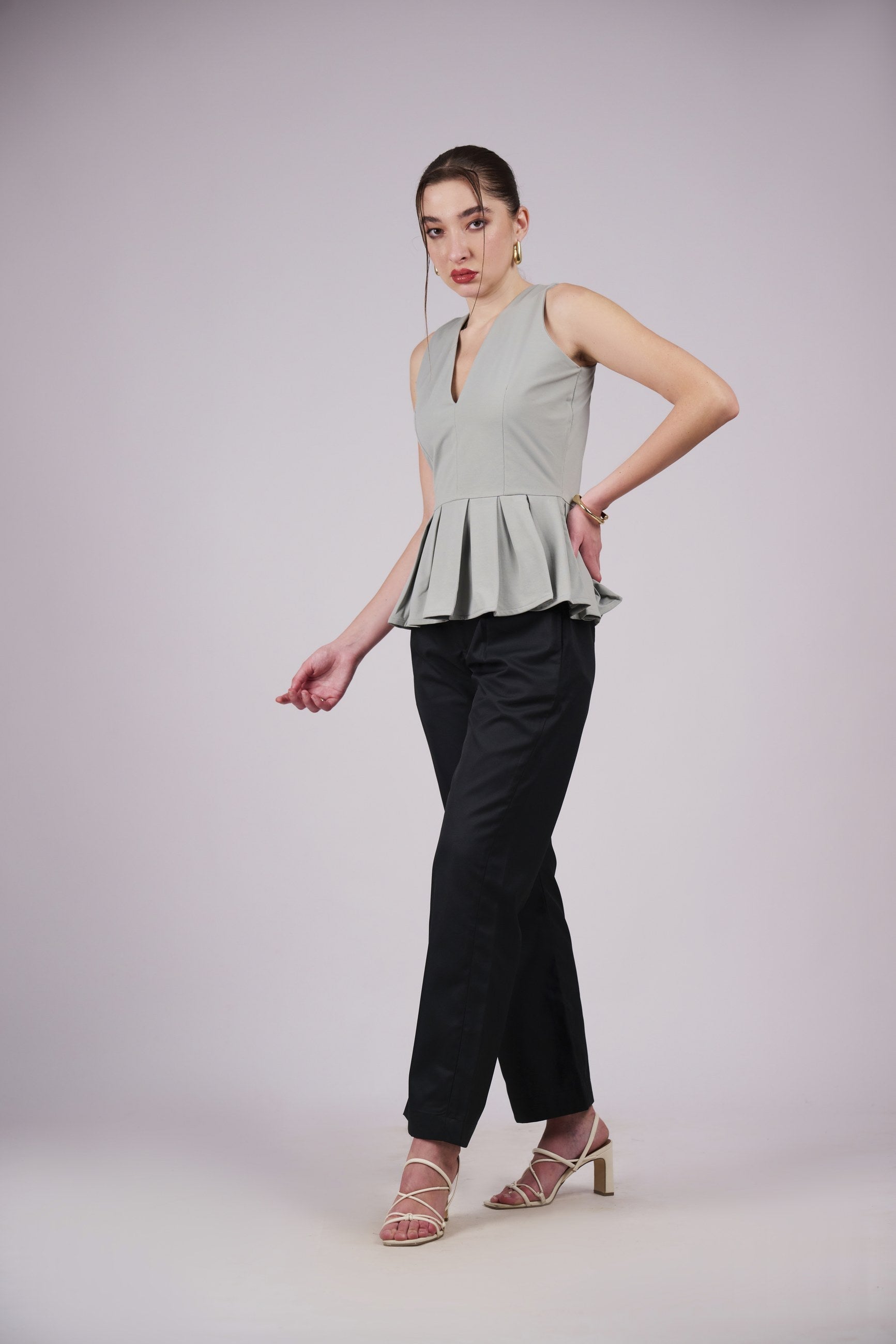 Sleeveless Peplum Top – White